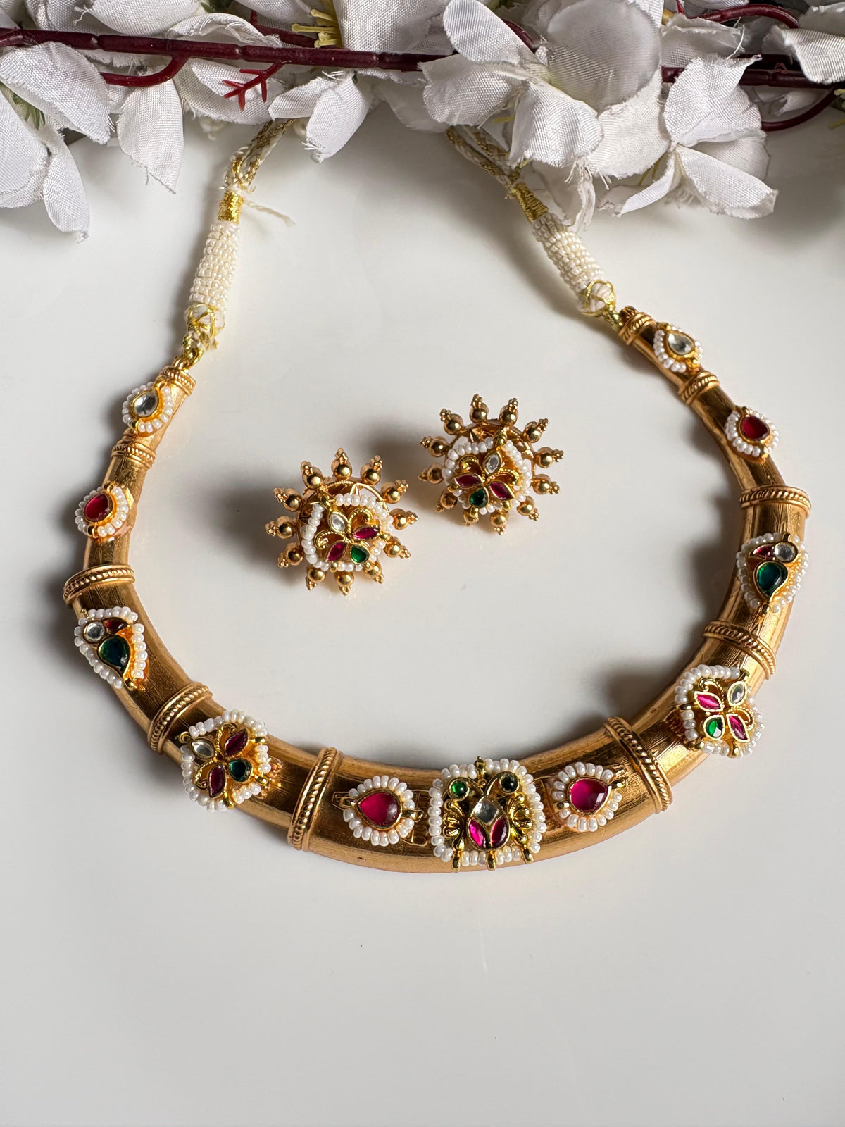 Noorva Kesar Kundan Gold Hasli Necklace Set with Earrings Online