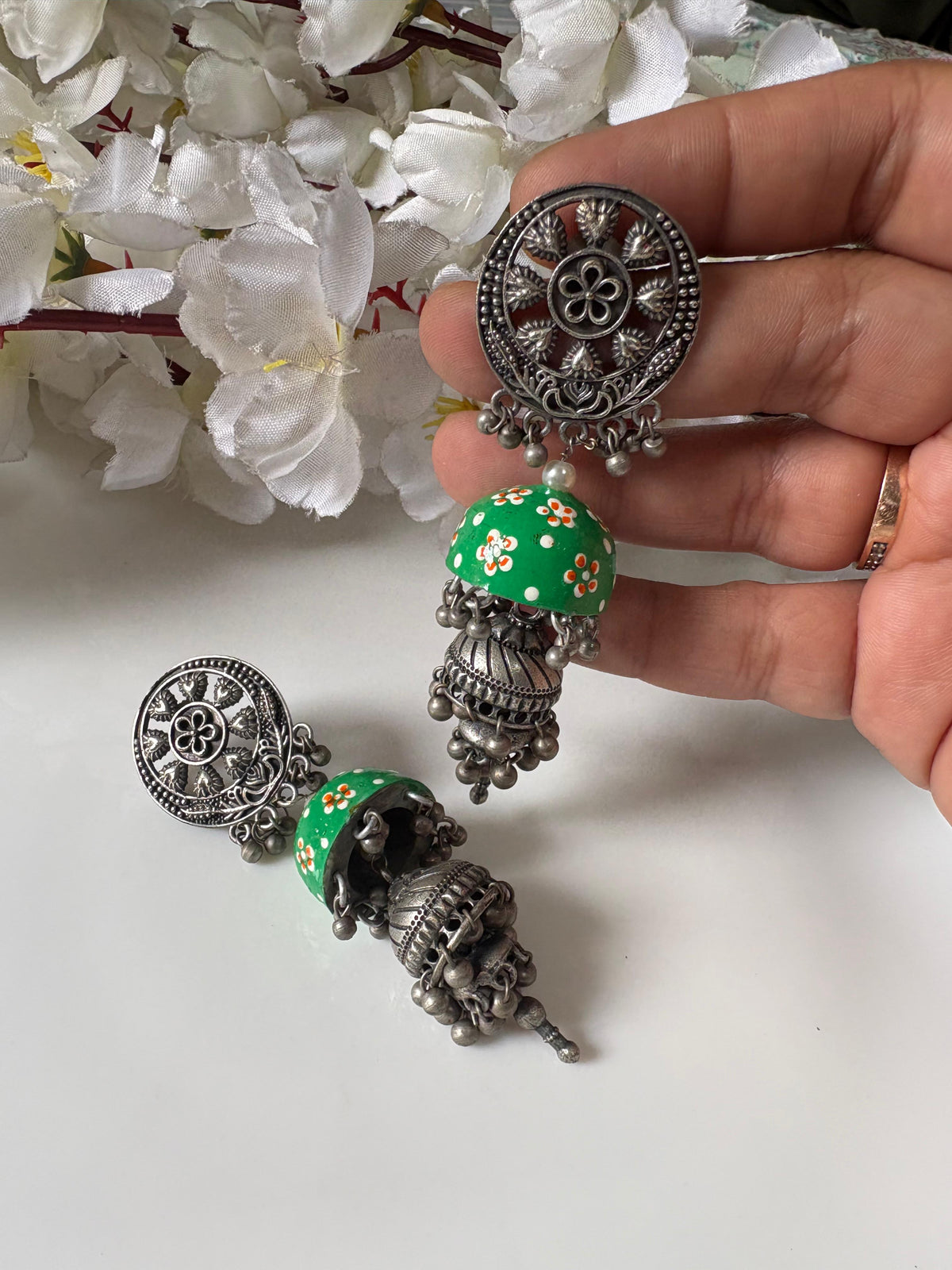 Hand-Painted Terracotta Jhumka Earrings
Antique Silver Jhumka Earrings | Handcrafted Folk Art Jewellery | Artisan Statement Earrings
