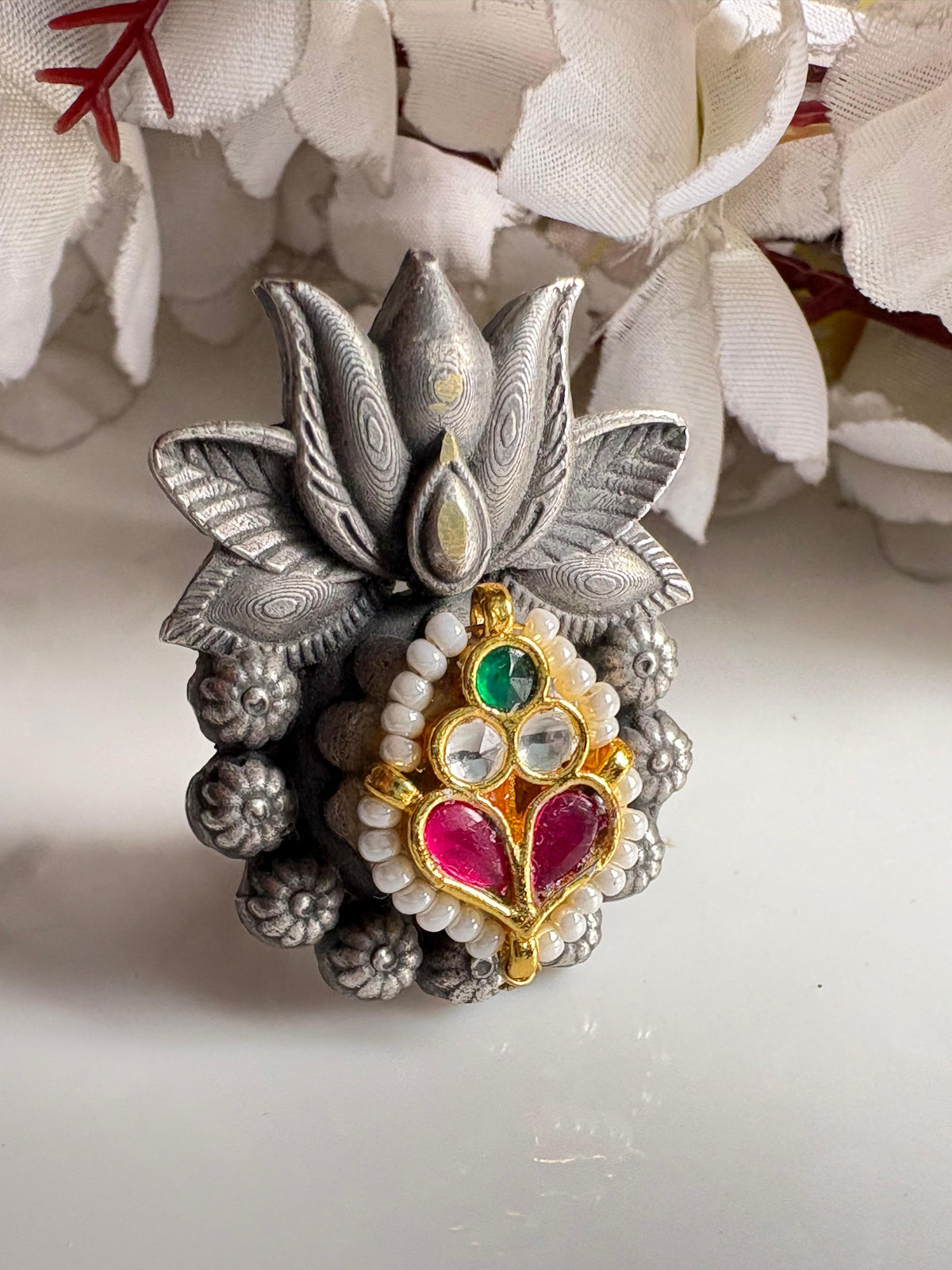 Padmika Lotus Kundan SLA Fusion Statement Ring

Handcrafted Antique Silver Lotus Ring | Kundan SLA Fusion Adjustable Cocktail Ring | Designer Ethnic Statement Jewellery