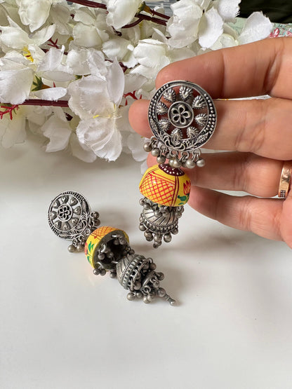 Hand-Painted Terracotta Jhumka Earrings
Antique Silver Jhumka Earrings | Handcrafted Folk Art Jewellery | Artisan Statement Earrings