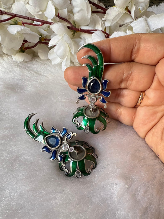Mayur Varnika Enamel Statement Earrings
Handcrafted Peacock-Inspired Enamel Earrings | Silver Finish Designer Drop Earrings | Festive & Wedding Jewellery