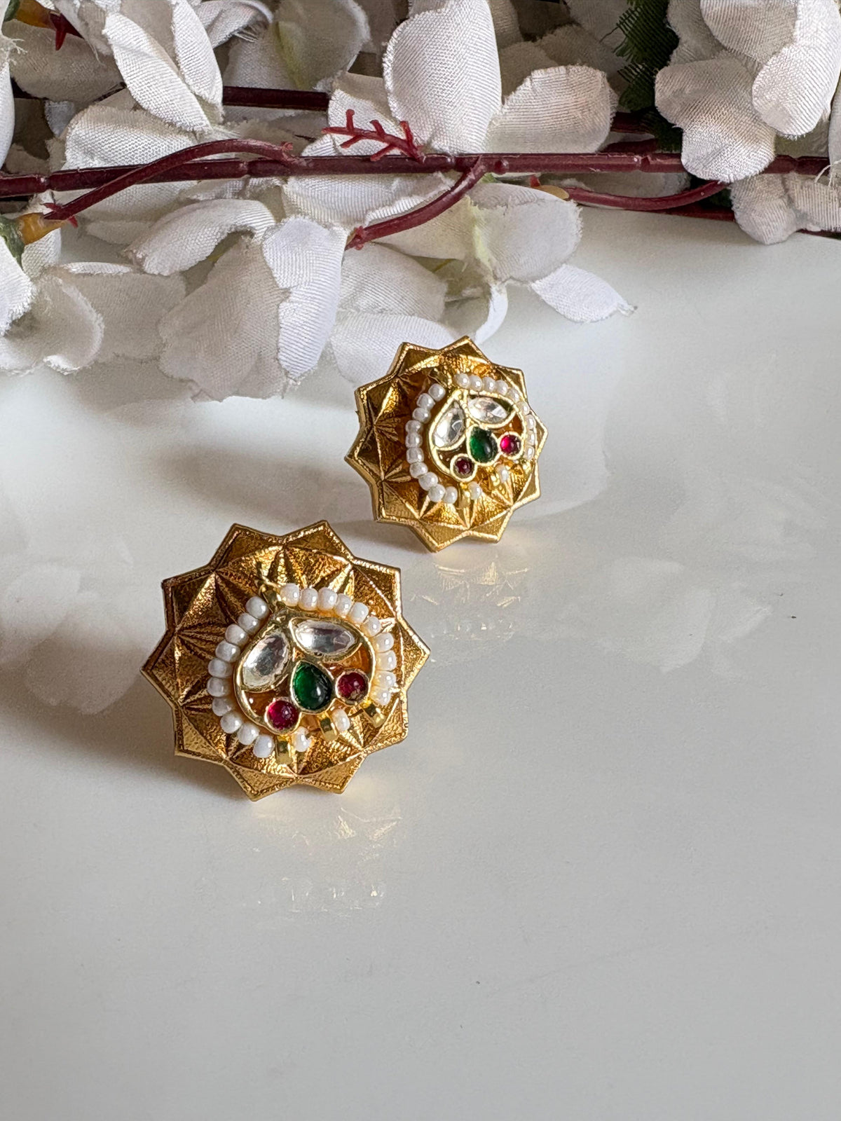 Suramya Pushpa Gold Matt Kundan Stud Earrings with Pearl & Green Ruby Accents | Budget Friendly Ethnic Jewellery | Alankrent by Alankrent
